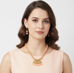 Handcrafted Peach Beaded Necklace Set with Gold-Toned Pendant
